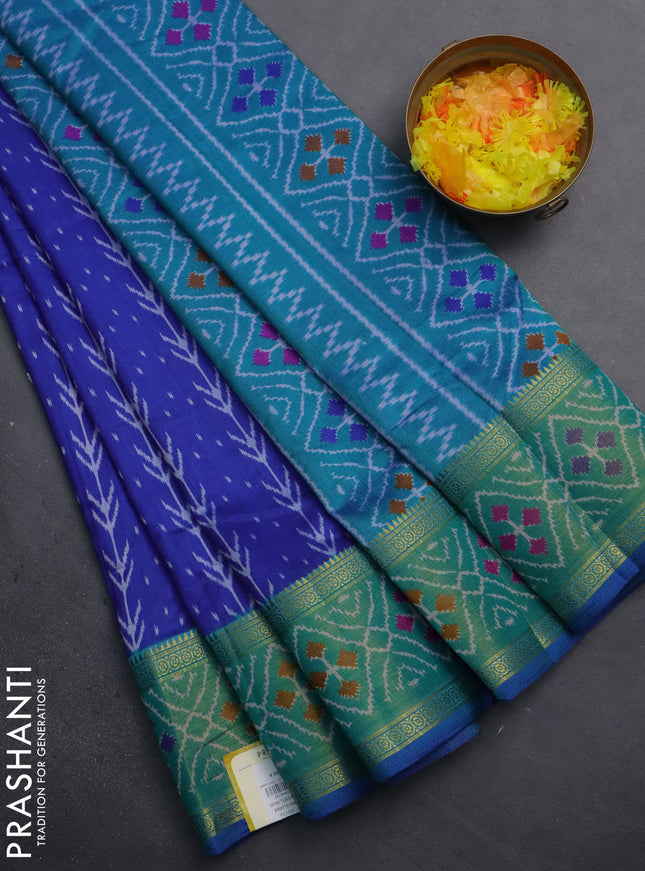 Semi tussar saree blue and teal green with allover ikat prints and zari woven ikat border