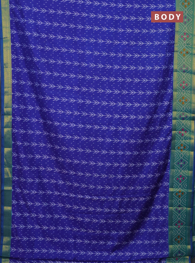 Semi tussar saree blue and teal green with allover ikat prints and zari woven ikat border