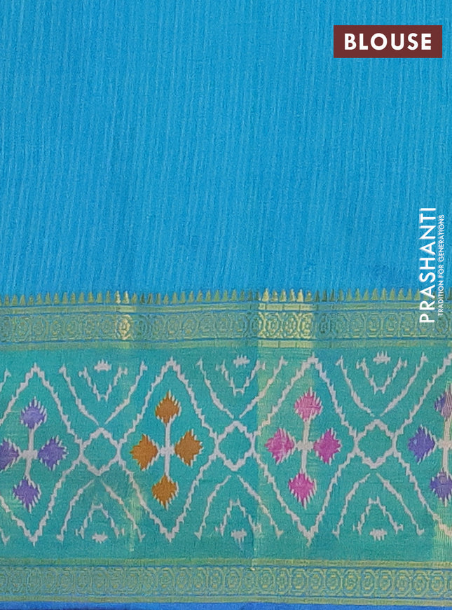 Semi tussar saree blue and teal green with allover ikat prints and zari woven ikat border