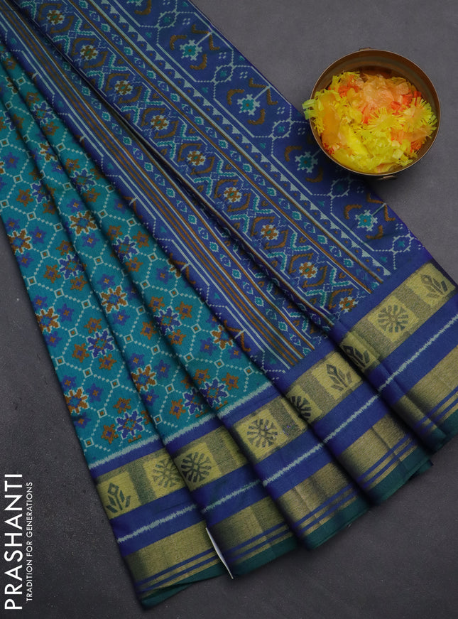 Semi tussar saree teal green and dual shade of blue with allover ikat prints and zari woven border