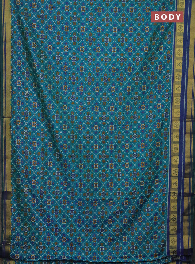 Semi tussar saree teal green and dual shade of blue with allover ikat prints and zari woven border