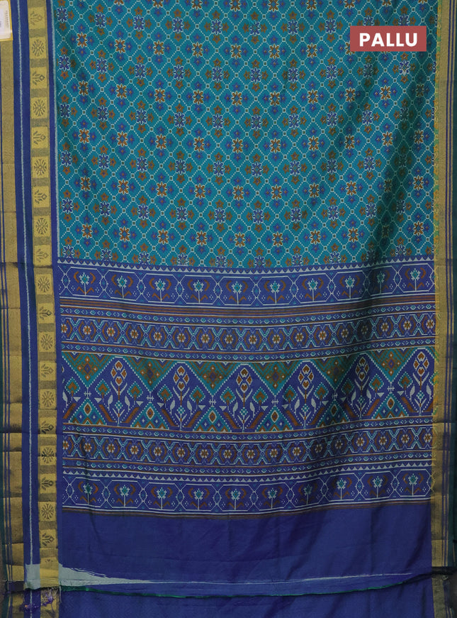 Semi tussar saree teal green and dual shade of blue with allover ikat prints and zari woven border