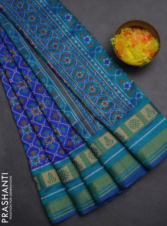 Semi tussar saree blue and teal blue with allover ikat prints and zari woven border
