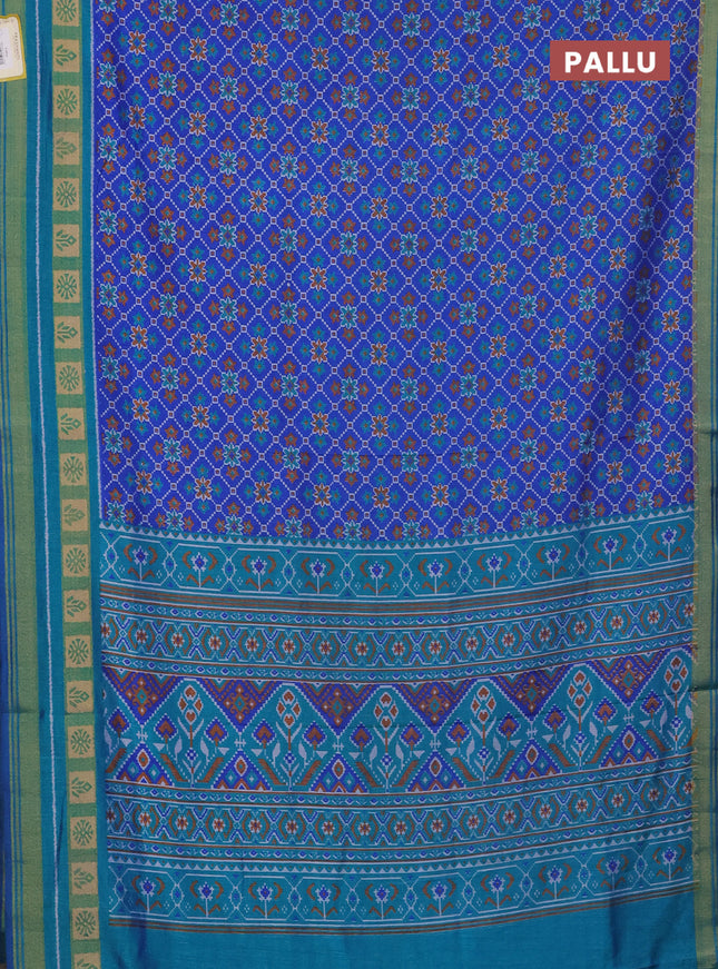 Semi tussar saree blue and teal blue with allover ikat prints and zari woven border