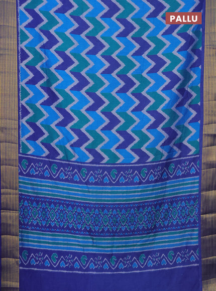 Semi tussar saree multi colour and blue with allover zig zag ikat prints and zari woven border