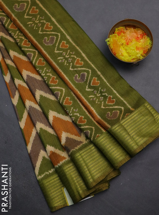 Semi tussar saree multi colour and sap green with allover zig zag ikat prints and zari woven border
