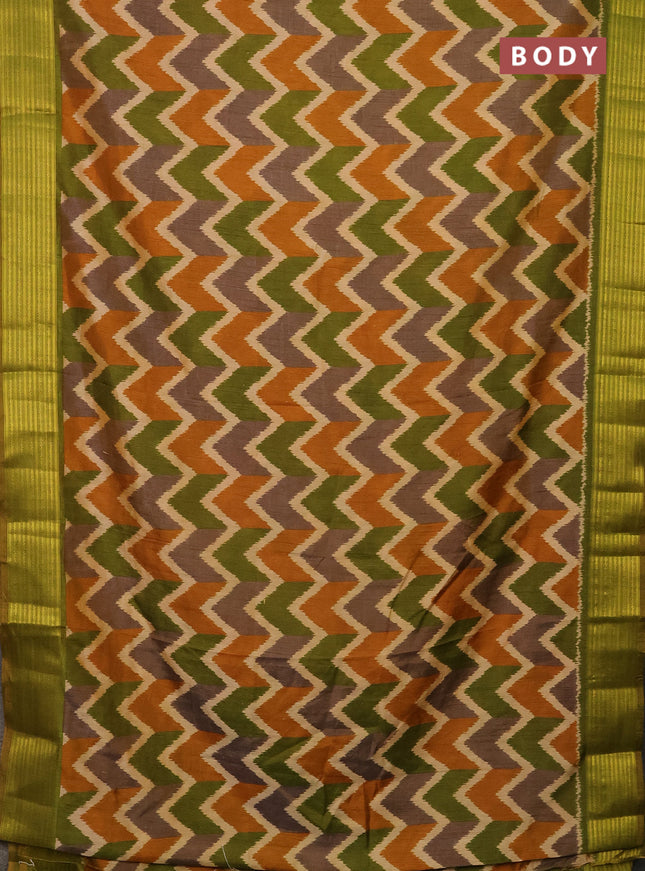 Semi tussar saree multi colour and sap green with allover zig zag ikat prints and zari woven border