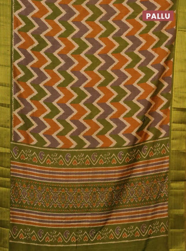 Semi tussar saree multi colour and sap green with allover zig zag ikat prints and zari woven border