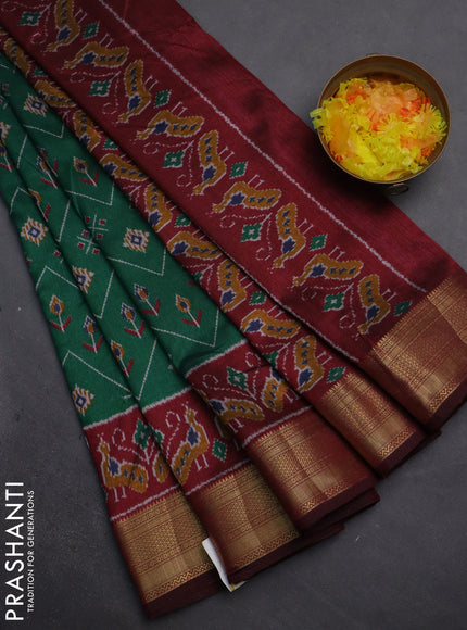 Semi tussar saree green and maroon with allover ikat prints and zari woven border