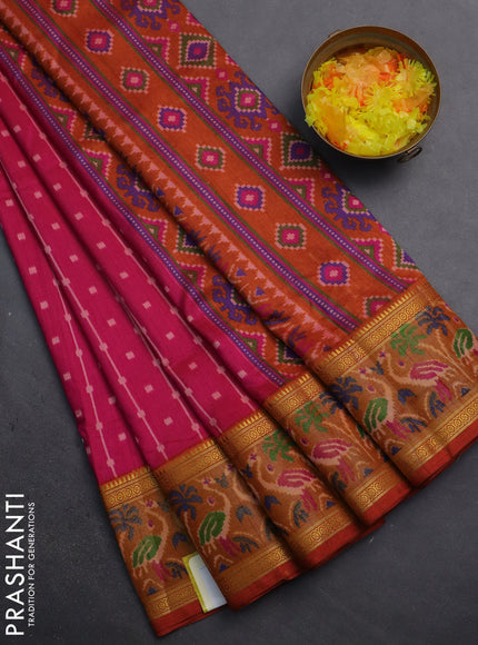 Semi tussar saree pink and dark mustard with allover ikat prints and zari woven ikat border