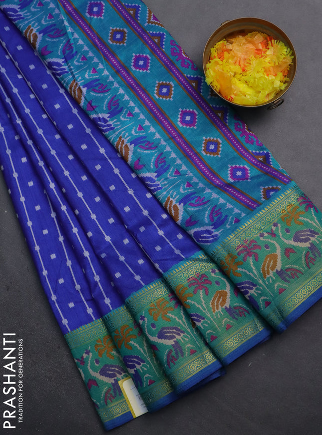 Semi tussar saree blue and teal green with allover ikat prints and zari woven ikat border