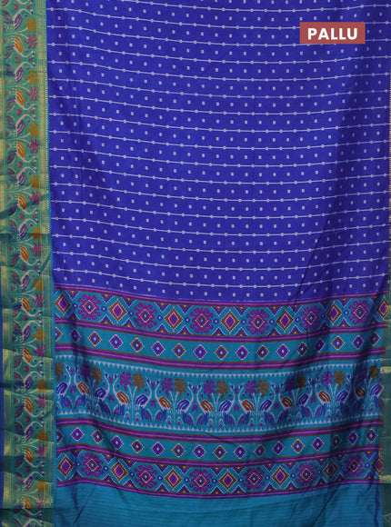 Semi tussar saree blue and teal green with allover ikat prints and zari woven ikat border