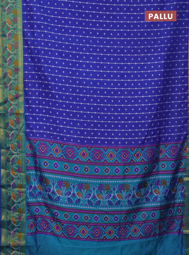 Semi tussar saree blue and teal green with allover ikat prints and zari woven ikat border