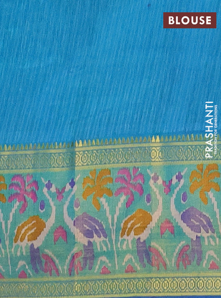 Semi tussar saree blue and teal green with allover ikat prints and zari woven ikat border