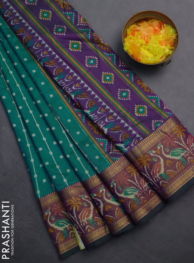 Semi tussar saree teal bluish green and purple with allover ikat prints and zari woven ikat border
