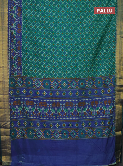 Semi tussar saree teal green and blue with allover ikat prints and zari woven border