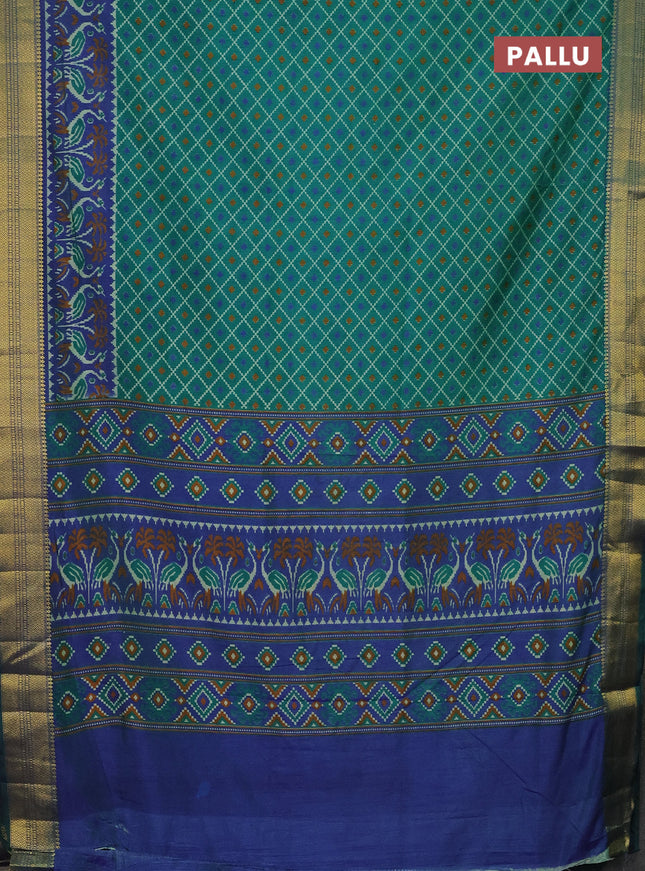 Semi tussar saree teal green and blue with allover ikat prints and zari woven border