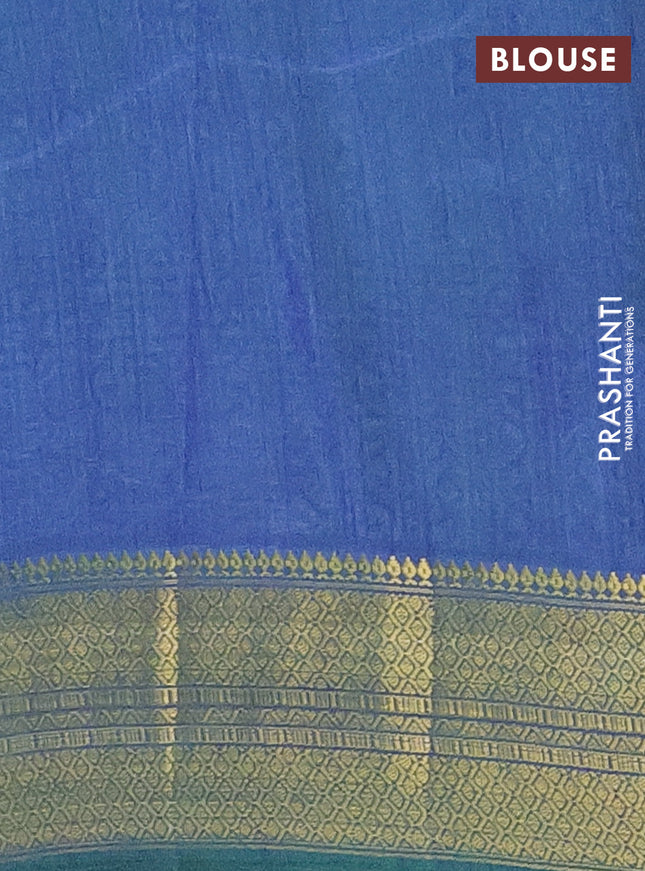 Semi tussar saree teal green and blue with allover ikat prints and zari woven border