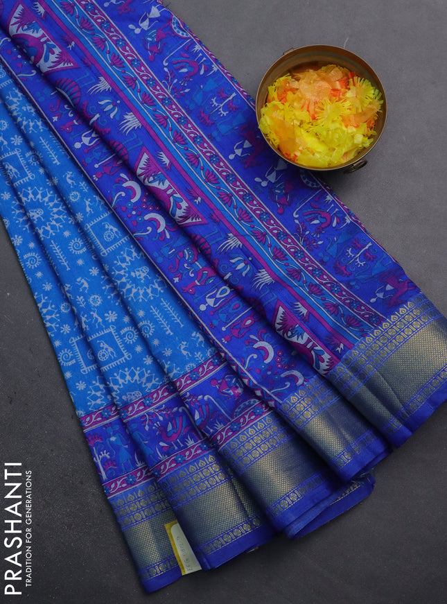 Semi tussar saree cs blue and blue with allover warli prints and zari woven border