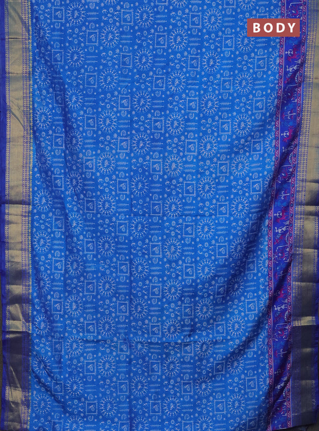Semi tussar saree cs blue and blue with allover warli prints and zari woven border