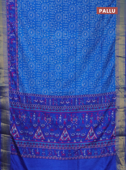 Semi tussar saree cs blue and blue with allover warli prints and zari woven border