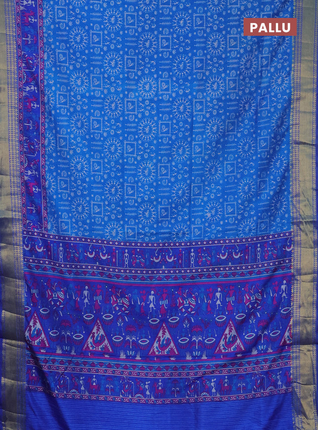 Semi tussar saree cs blue and blue with allover warli prints and zari woven border