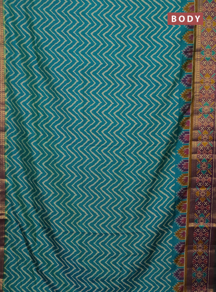 Semi tussar saree teal green and purple with allover zig zag prints and zari woven ikat border