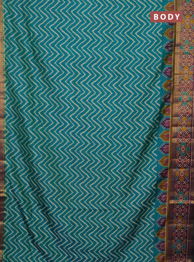 Semi tussar saree teal green and purple with allover zig zag prints and zari woven ikat border