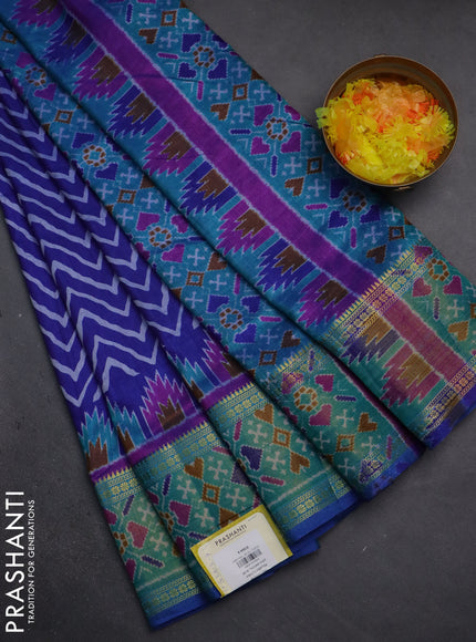Semi tussar saree blue and teal green with allover zig zag prints and zari woven ikat border