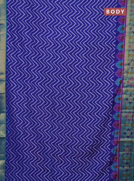 Semi tussar saree blue and teal green with allover zig zag prints and zari woven ikat border