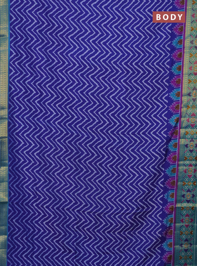 Semi tussar saree blue and teal green with allover zig zag prints and zari woven ikat border