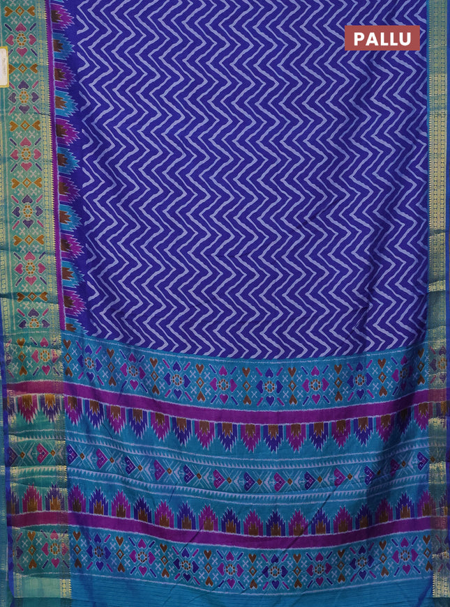 Semi tussar saree blue and teal green with allover zig zag prints and zari woven ikat border