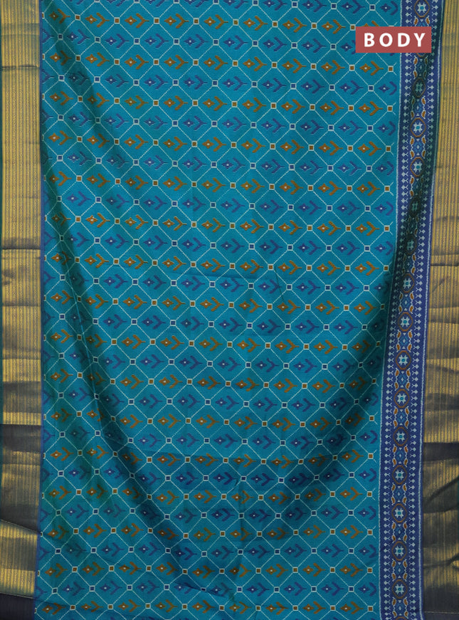 Semi tussar saree teal bluish green and dual shade of blue with allover ikat prints and zari woven border