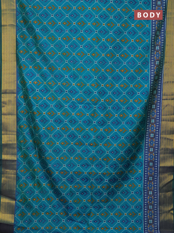 Semi tussar saree teal bluish green and dual shade of blue with allover ikat prints and zari woven border