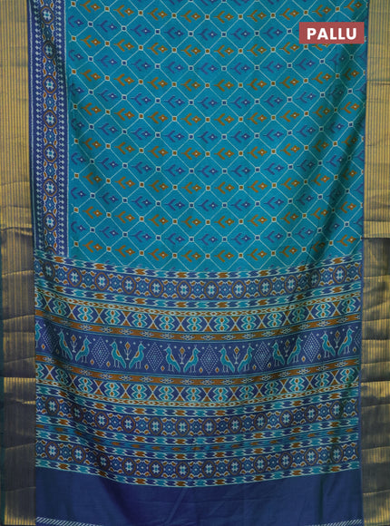 Semi tussar saree teal bluish green and dual shade of blue with allover ikat prints and zari woven border