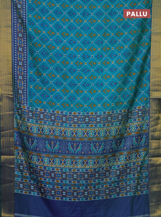 Semi tussar saree teal bluish green and dual shade of blue with allover ikat prints and zari woven border