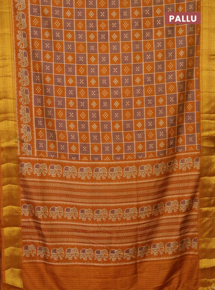 Semi tussar saree grey shade and mustard yellow with allover ikat prints and zari woven border