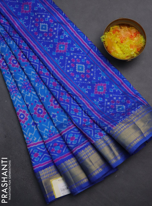 Semi tussar saree cs blue and blue with allover ikat prints and zari woven border