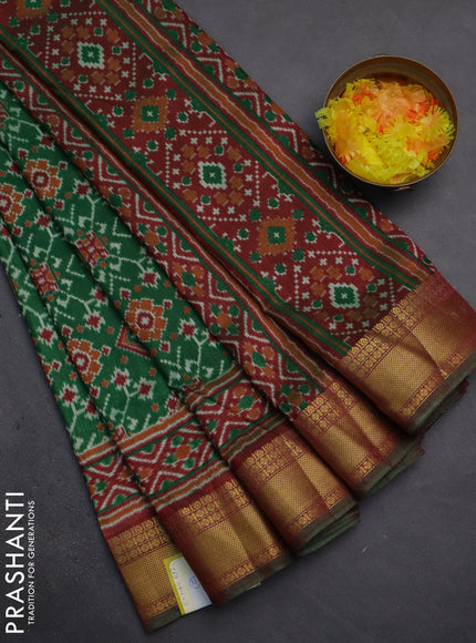 Semi tussar saree green and maroon with allover ikat prints and zari woven border