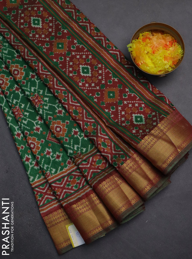 Semi tussar saree green and maroon with allover ikat prints and zari woven border