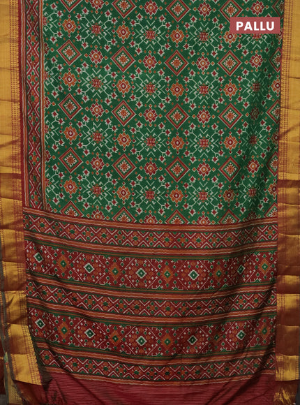 Semi tussar saree green and maroon with allover ikat prints and zari woven border