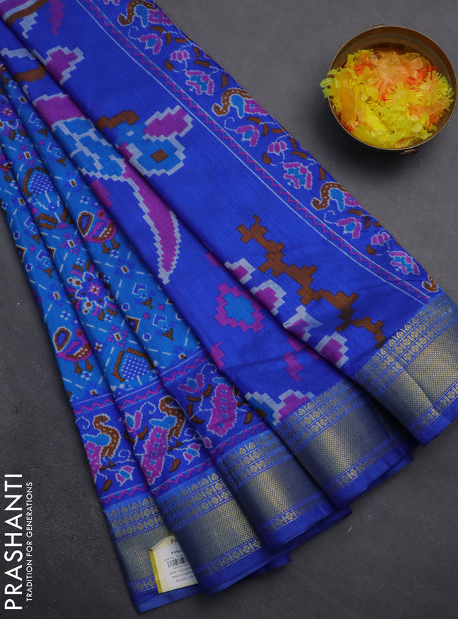 Semi tussar saree blue and cs blue with allover ikat prints and zari woven border