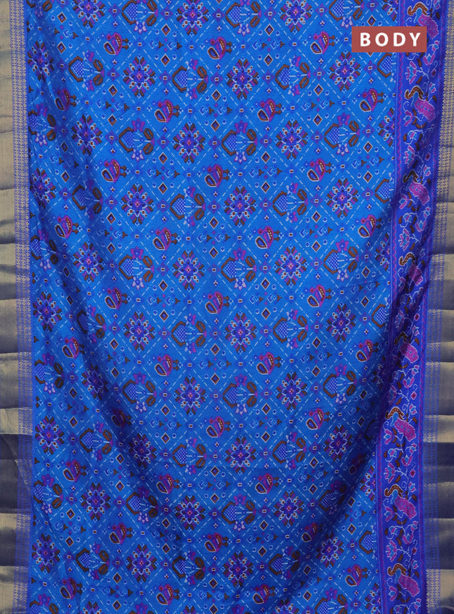 Semi tussar saree blue and cs blue with allover ikat prints and zari woven border