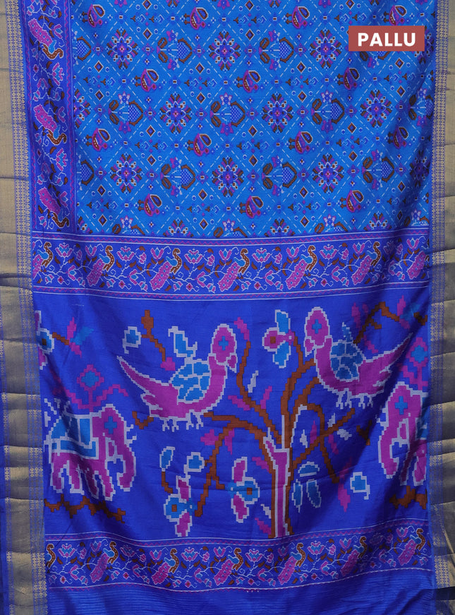 Semi tussar saree blue and cs blue with allover ikat prints and zari woven border