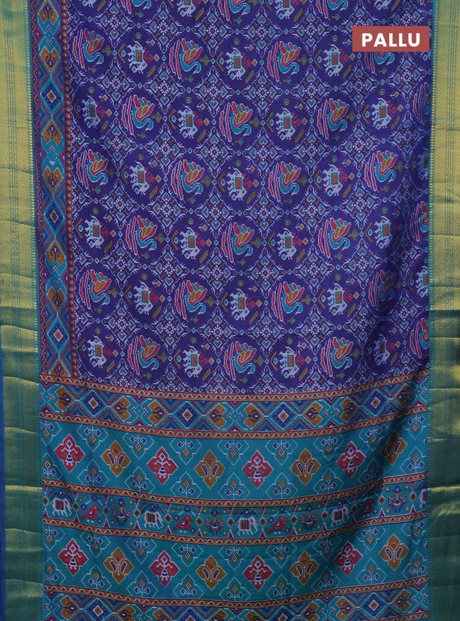 Semi tussar saree blue and teal green with allover ikat prints and zari woven border
