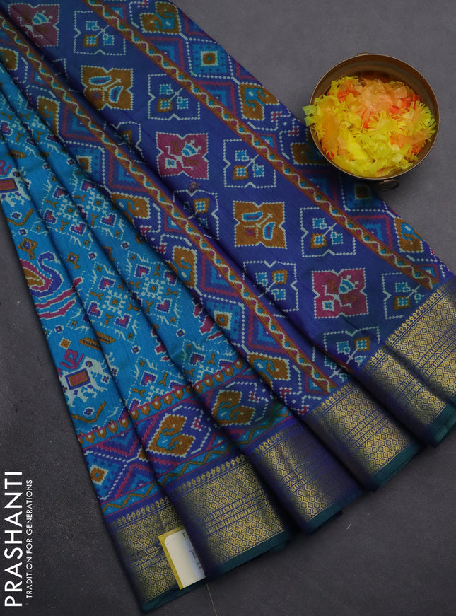 Semi tussar saree dual shade of teal bluish green and dual shade of blue with allover ikat prints and zari woven border