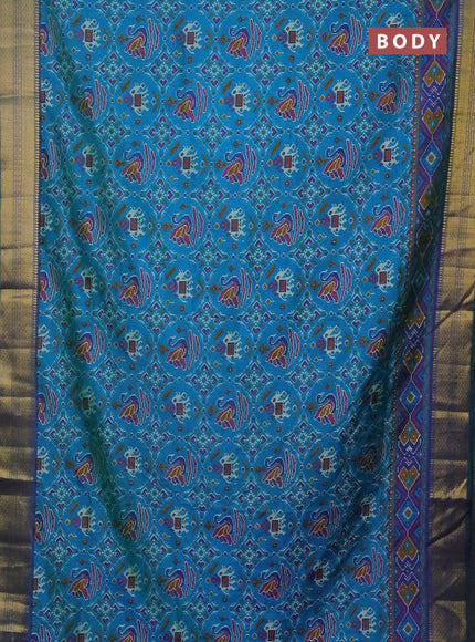 Semi tussar saree dual shade of teal bluish green and dual shade of blue with allover ikat prints and zari woven border