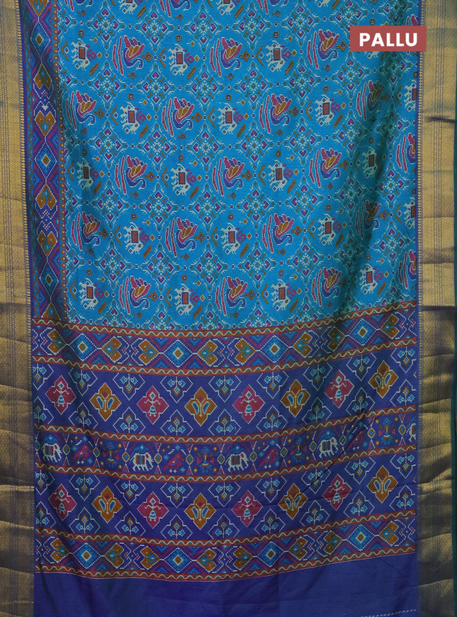 Semi tussar saree dual shade of teal bluish green and dual shade of blue with allover ikat prints and zari woven border