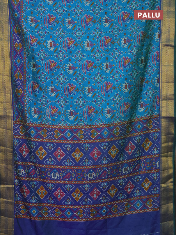 Semi tussar saree dual shade of teal bluish green and dual shade of blue with allover ikat prints and zari woven border