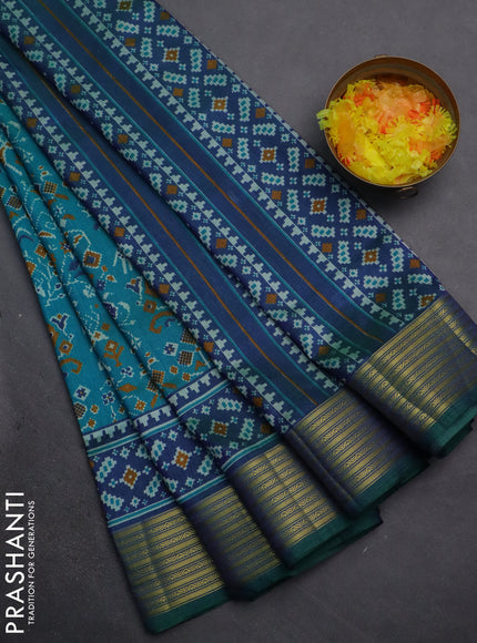Semi tussar saree teal blue and dual shade of bluish green with allover ikat prints and zari woven border
